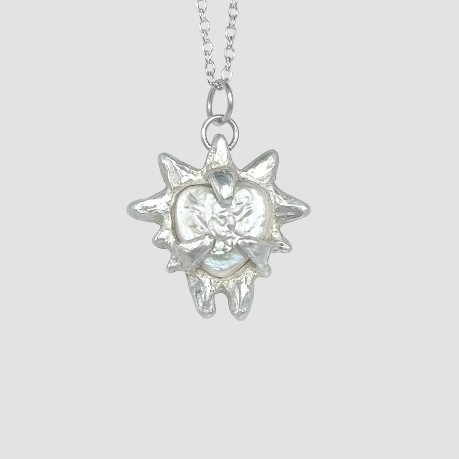 NORAPE silver pendant