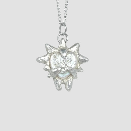 NORAPE silver pendant