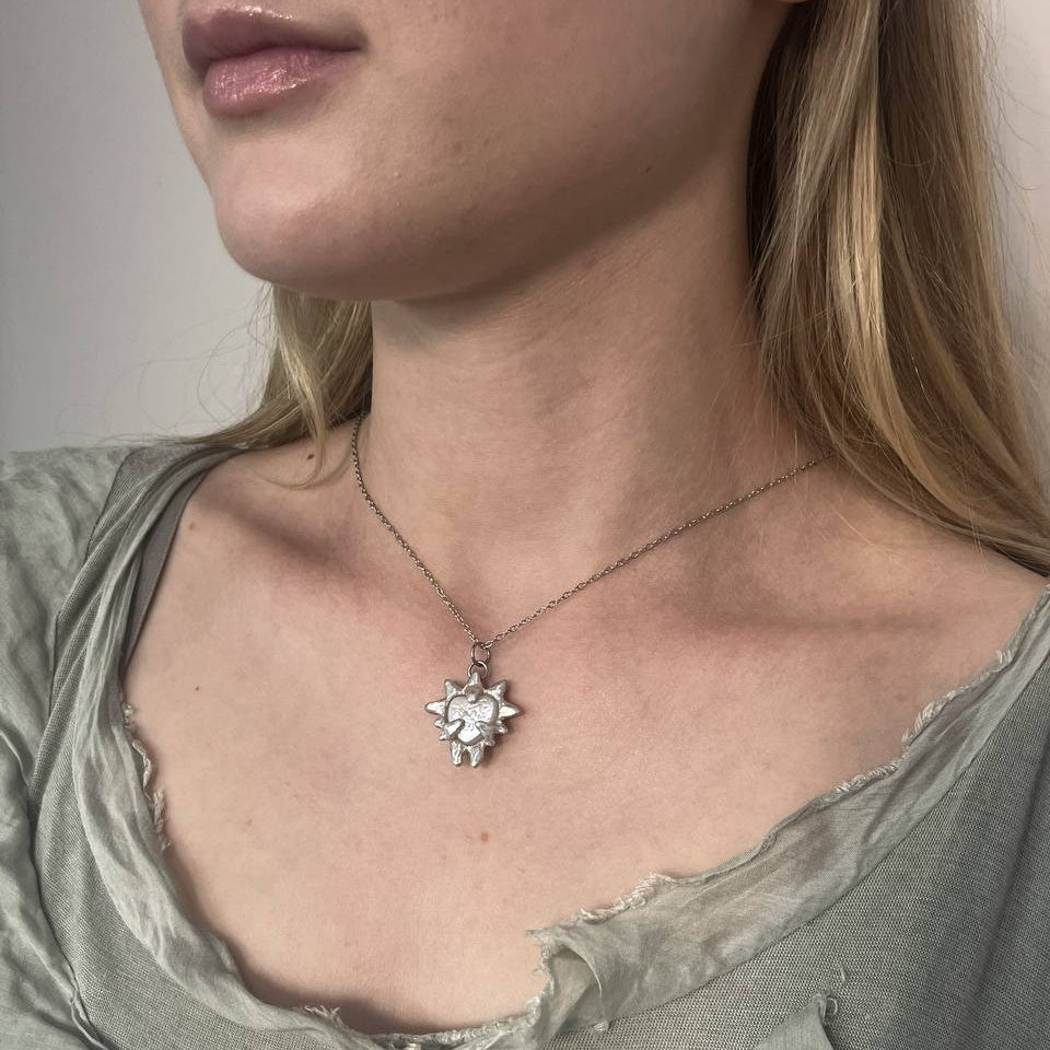 NORAPE silver pendant
